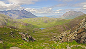 Sgurr na Stri's grassy slopes, with the mountains of Sgurr nan Gillean and Marsco in the background