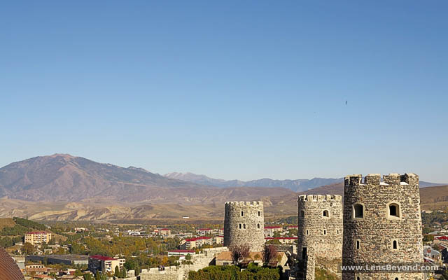 View from Akhaltsikhe's castle; 3 turrets and distant brown hills