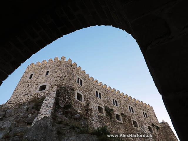 The castle keep through an archway