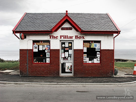 Whiting Bay Post Office backed by the Firth of Clyde, by Alex Harford